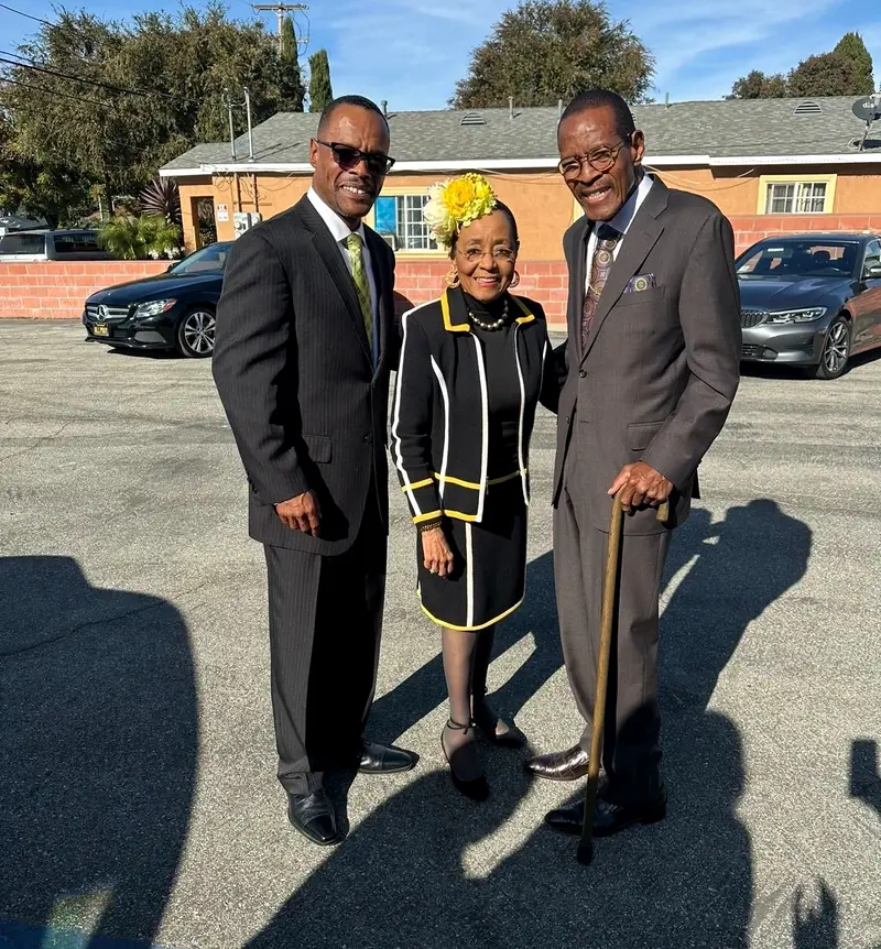 Palm Lane leaders outside the church