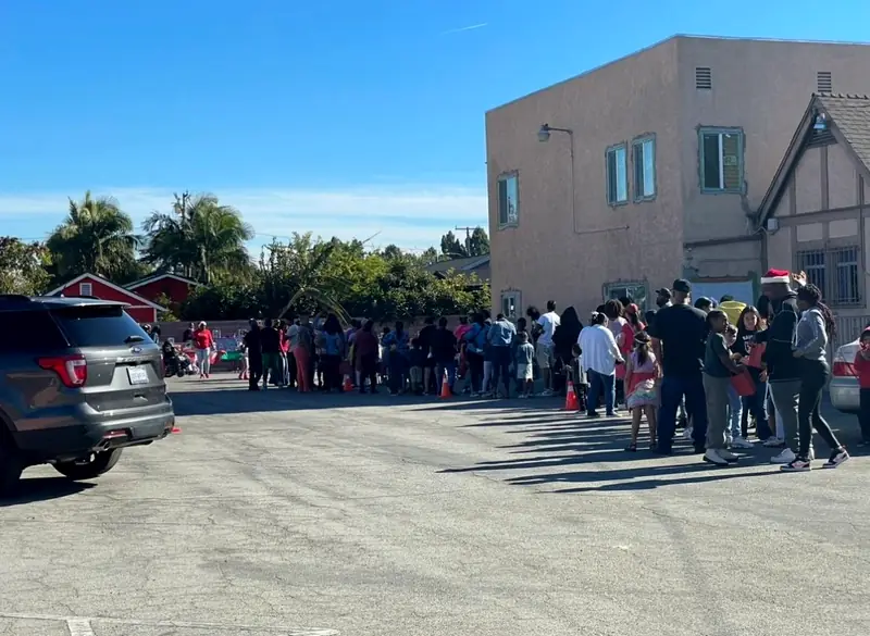 Neighbors lining up for a Palm Lane community outreach